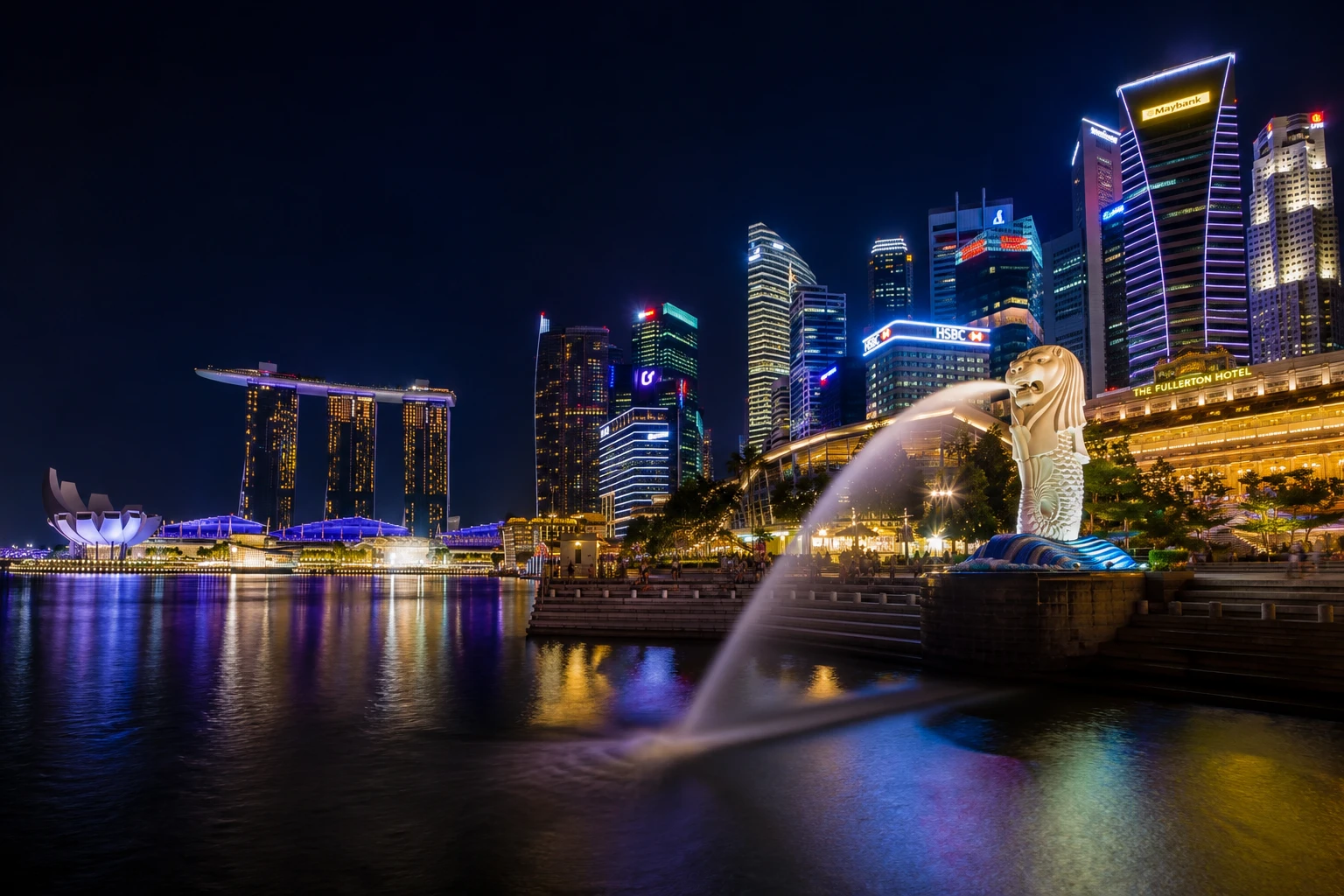 The Merlion fountain and Marina Bay skyline at night, Singapore