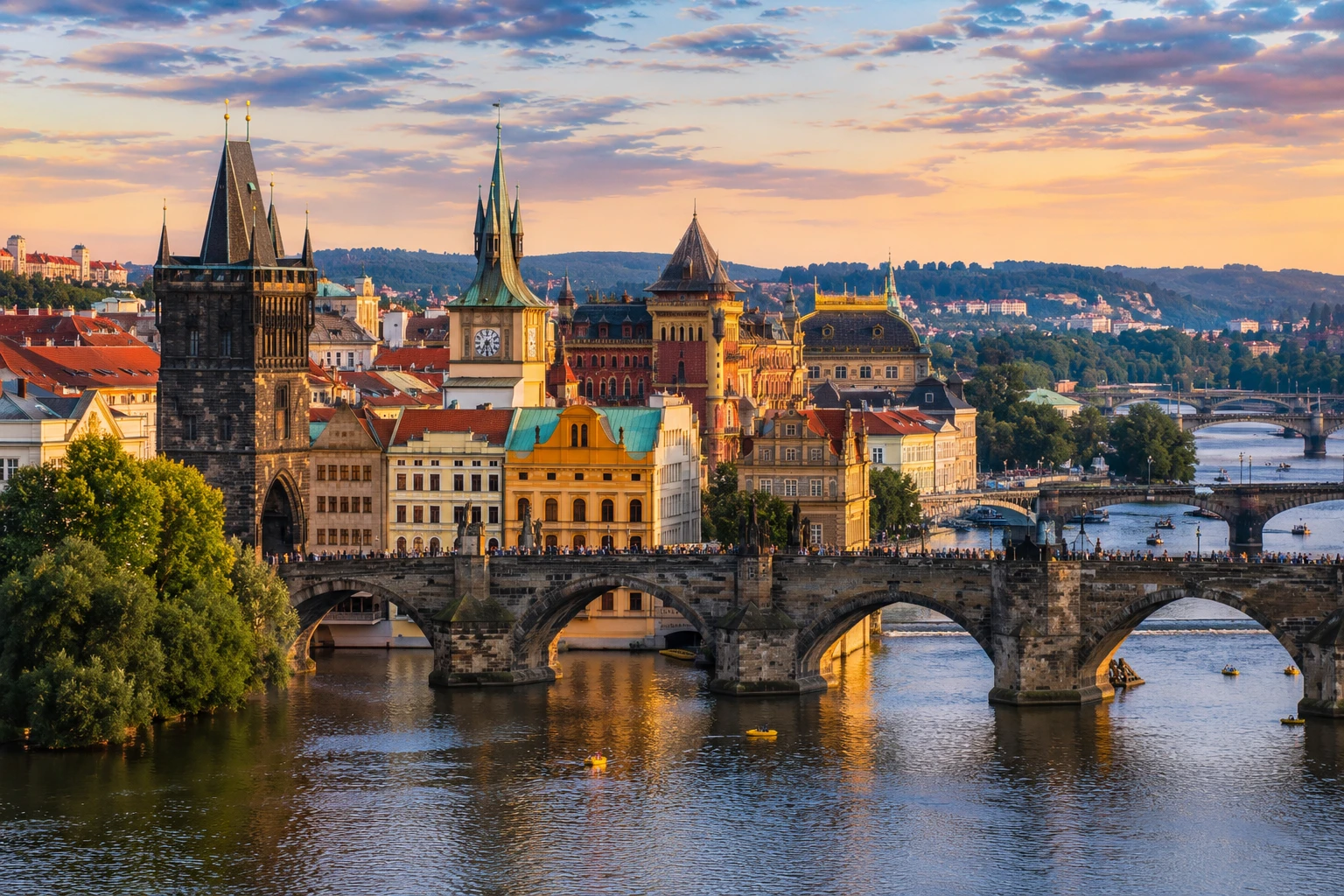 Charles Bridge and Prague's Old Town spires at sunset